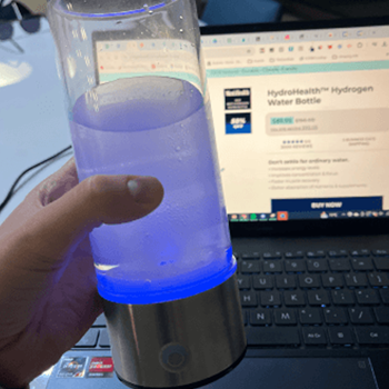 Customer using a LifeWater Hydrogen Bottle at a desk